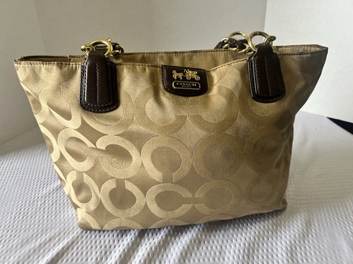 Borsa a tracolla Coach Madison Op Art 20481 oro marrone chiaro con fodera viola