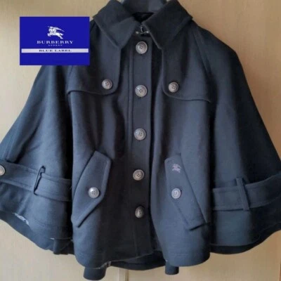Abrigo poncho Burberry etiqueta azul ropa exterior de lujo elegante moda para mujer JP Foto 1 de 4