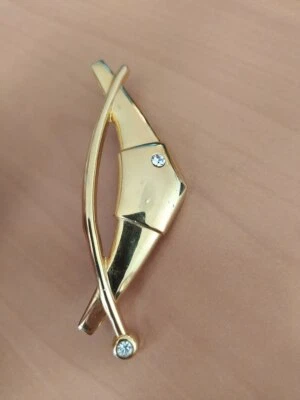 Juego de broches en metal amarillo con 2 piedras blancas Foto 1 de 4