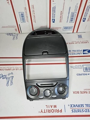Toyota Celica 2000-2005 tablero central radio bisel almacenamiento moldura cubby con reloj fabricante de equipos originales Foto 1 de 4