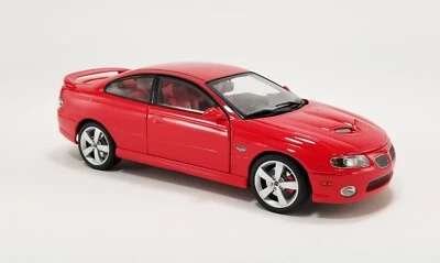 GMP ACME 1:18 2006 PONTIAC GTO TORRID RED WITH RED INTERIOR NEW 18987 - Image 1 of 4