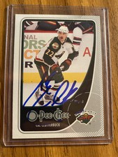 2010-11 SIGNED  O-Pee-Chee Hockey #10 Cal Clutterbuck w/ TOPLOADER