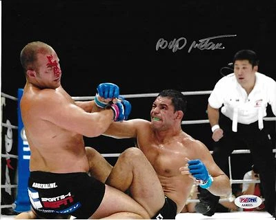 Foto firmada por Antonio Rodrigo Nogueira 8x10 certificado de autenticidad PSA/DNA UFC Pride Picture v Fedor Foto 1 de 2