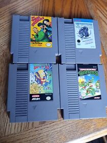 NES Lot- 4 Movie Games- Ninja Turtles, Xenophobe, 3 Stooges, Bart Vs. The World