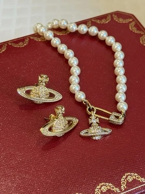 Combo de pendientes + collar Vivienne Westwood Foto 1 de 4