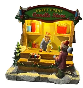 Weihnachtsdorf Laden LED beleuchtet süßer Duft Kerzenladen Straßenverkäufer - Bild 1 von 5
