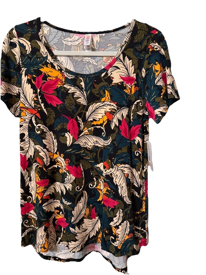 Lote - 6 Camisetas LulaRoe Clásicas XS ARTÍCULOS EXTRA INCLUIDOS Floral, Cachemira, Pixel Foto 1 de 4