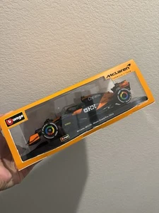 Bburago 1:24 2024 Race McLaren MCL38 Miami GP with Helmet, Lando Norris #4 - Picture 1 of 4