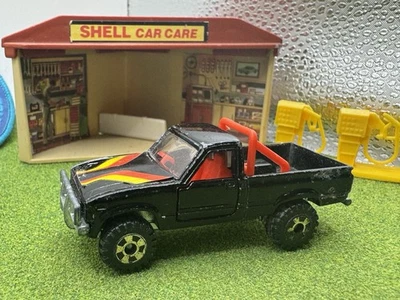 Tomica Toyota HiLux 4WD Black No. 61 Japan Toy Truck Hi Lux Tomy Pocket Car SR5 - Image 1 of 4