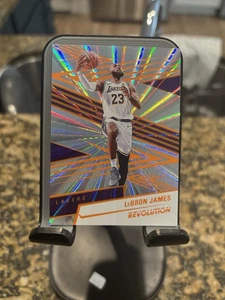 LeBron James 2024-25 Panini Revolution Sunburst /75 #31 - Bild 1 von 2