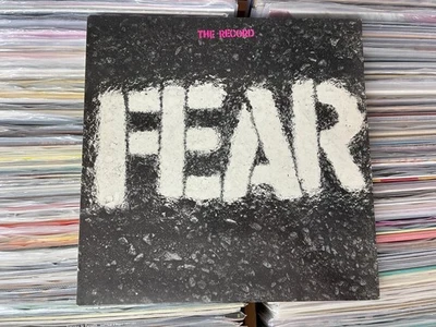 FEAR – The Record RARE NEAR MINT 1983 REISSUE SLASH VINYL LP - Image 1 of 4
