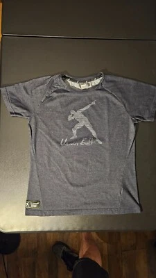 Camiseta Usain Bolt Puma Para Hombre L Gris Gráfico Colección Cápsula Manga Corta Foto 1 de 4