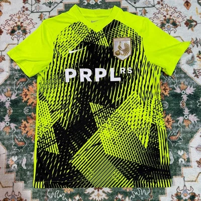 Camiseta deportiva para mujer Nike Dri-FIT PRPL RS verde neón negra Foto 1 de 4