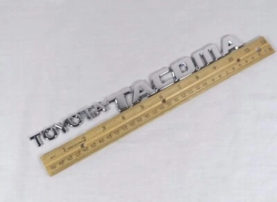 95-04 Toyota Tacoma Emblem Front Door Chrome Badge Nameplate Sign Symbol Logo - Image 1 of 2