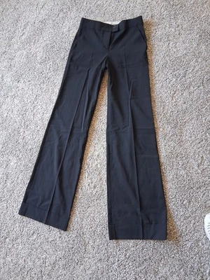 Pantalones de vestir Valentino rojos ajustados de lana virgen súper largos plisados negros 0/38 Foto 1 de 4