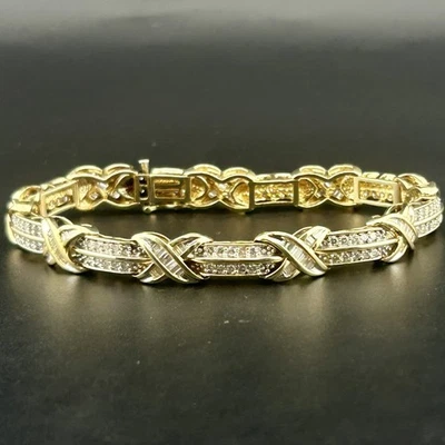 BRAZALETE TENIS DIAMANTE 5,40 CTW S12 I-J ORO 14KY REDONDO/BAGUETTES 7,5" 23,44G Foto 1 de 4