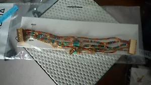 SUPERBE BRACELET "HIPANEMA" DORE/KANELLE AMBRE/TL/NEUF - Imagen 1 de 2