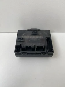 UNIDAD CONTROL PUERTA AUDI - Imagen 1 de 3