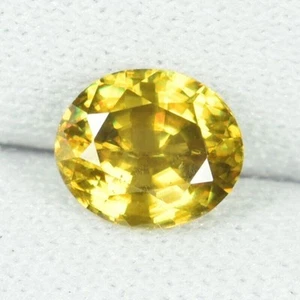 1.23 ct SHIMMERING  BROWNISH YELLOW BEST  SPARKLING NATURAL SPHENE See Vdo RC - Picture 1 of 3