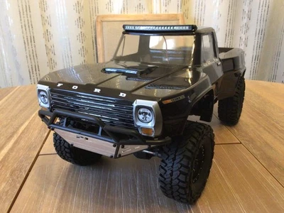 Axial SCX10 iii RC Basecamp w/Proline 67 Ford F100 body and Flysky FS-GT3C - Image 1 of 4