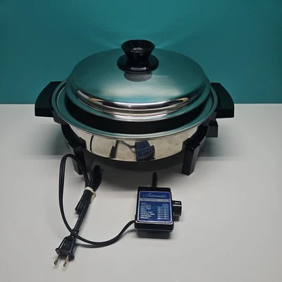 Электрическая сковорода West Bend с жидким сердечником из нержавеющей стали с крышкой No17884 протестирована в США - Изображение 1 из 4