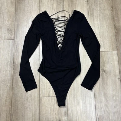 Body VICTORIAS SECRET con cordones manga larga negro talla pequeña S Foto 1 de 4