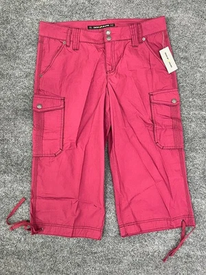 NUEVO CON ETIQUETAS DKNY Pantalones de mezclilla para mujer rojos/marrones bolsillos lengüeta enrollable cargo pantalones capri 12 Foto 1 de 4