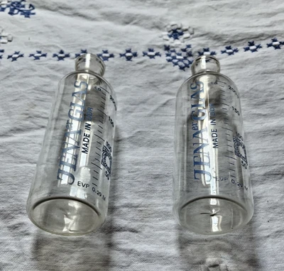 2 orginale DDR Nuckelflaschen,  Jenaer Glas, Milchflasche, Baby Babyflasche - Bild 1 von 4