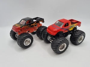 Hot Wheels Monster Jam Screaming Demon & Tropical Thunder Monster Truck 1:64 - Foto 1 di 15