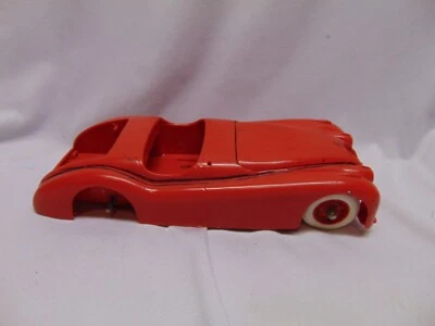 vintage plastic red Jaguar model car for parts 12" x 4" x 3" - Image 1 of 4