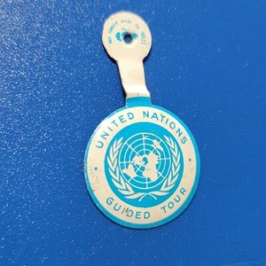 pop culture pinback Vtg Button 70s 80s Dangle Hanger United Nations Guided Tour - Picture 1 of 5