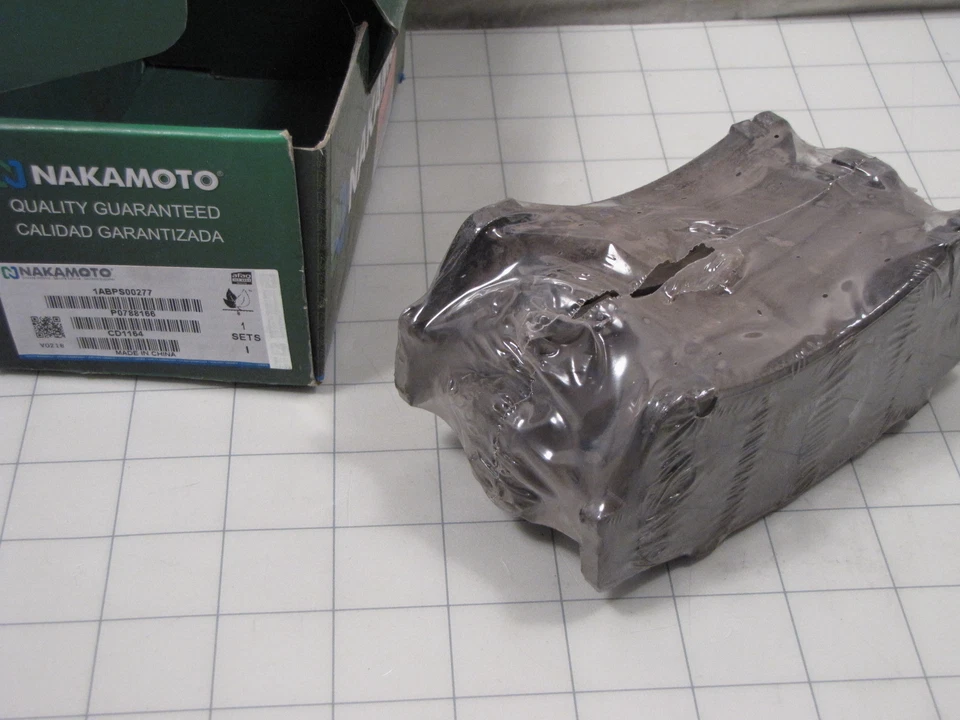 Juego de pastillas de freno delanteras de cerámica Nakamoto 1ABPS00277 para Ford Lincoln Mazda NUEVO Foto 1 de 1