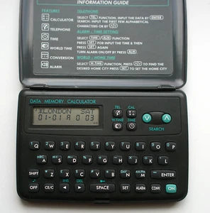 Vintage 1980s Travel Master Calculator, Alarm, Clock, Conversion Computer Boxed - Afbeelding 1 van 6