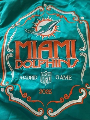 Mitchell & Ness. Chaqueta Miami Dolphin in Madrid Juego 2025 Edición Limitada Foto 1 de 4