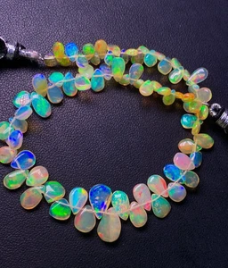 Ethiopian Opal Natural pear Shape Briolette Smooth Multi Fire 4x5-7.50X10 MM - Picture 1 of 19