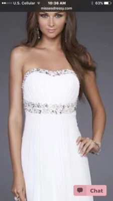 Vestido blanco con detalles de estrás Foto 1 de 4