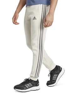 Adidas Mens Beige Essentials Fleece 3 Stripes Tapered Cuff Pants Size S NWT - Picture 1 of 7