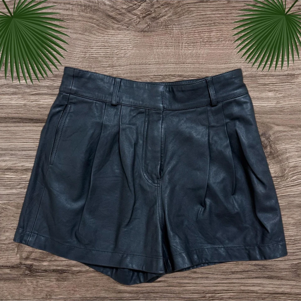 Pantalones Cortos Con Marco Para Mujer 26 Cuero Negro Plisado Tiro Alto Informales Bolsillos Cremallera Foto 1 de 4