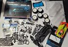 Team Xray XB4 2020 1/10th off road RC car with big spares package box and manual