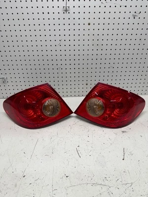 Toyota Corolla 2003-2005 conductor pasajero diestro diestro conjunto de luces traseras exteriores OEM Foto 1 de 4
