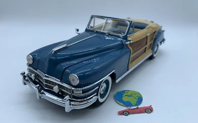 Franklin Mint Chrysler Town & Country 1948, scala (1:24- 1:25), vintage (2493) - Immagine 1 di 4