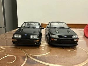 MINICHAMPS 1/18 FORD ESCORT COSWORTH E FORD SIERRA COSWORTH - Foto 1 di 4