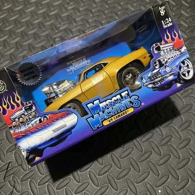 1/24  MUSCLE MACHINES  1969 CAMARO GOLD - Image 1 of 4
