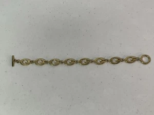 Pulsera GUESS “G” diseño tono dorado. Usado anteriormente. - Imagen 1 de 9