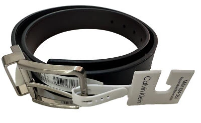 Nuevo con etiquetas Cinturón reversible para hombre Calvin Klein negro/marrón talla M (34-36) sintético Lth Foto 1 de 4