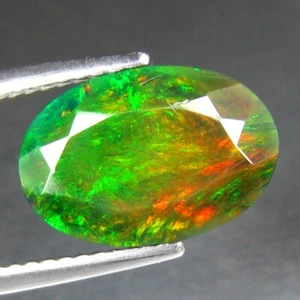 2.07 CT 12X8MM OVALADO, INCREÍBLE MULTICOLOR BRILLANTE NATURAL SÓLIDO ÓPALO NEGRO - Imagen 1 de 3