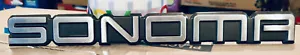 NOS GMC OEM 1995-2004 Sonoma Door Tailgate Emblem Badge Logo Nameplate 15700059 - Picture 1 of 3