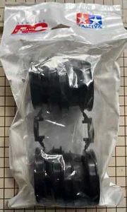 Tamiya Set Ruote RC Nero Confezione da 4 per Egress: 58583 47489 # 9335066 - Foto 1 di 2