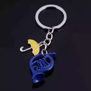 Cómo conocí a vuestra madre paraguas amarillo cuerno francés azul llavero llavero HIMYM UK - Imagen 1 de 5