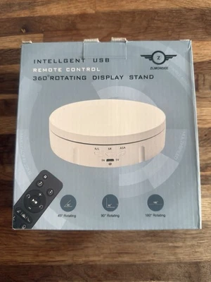 Soporte de exhibición giratorio 360 con cargador USB de control remoto para fotografía de muñecas Foto 1 de 4